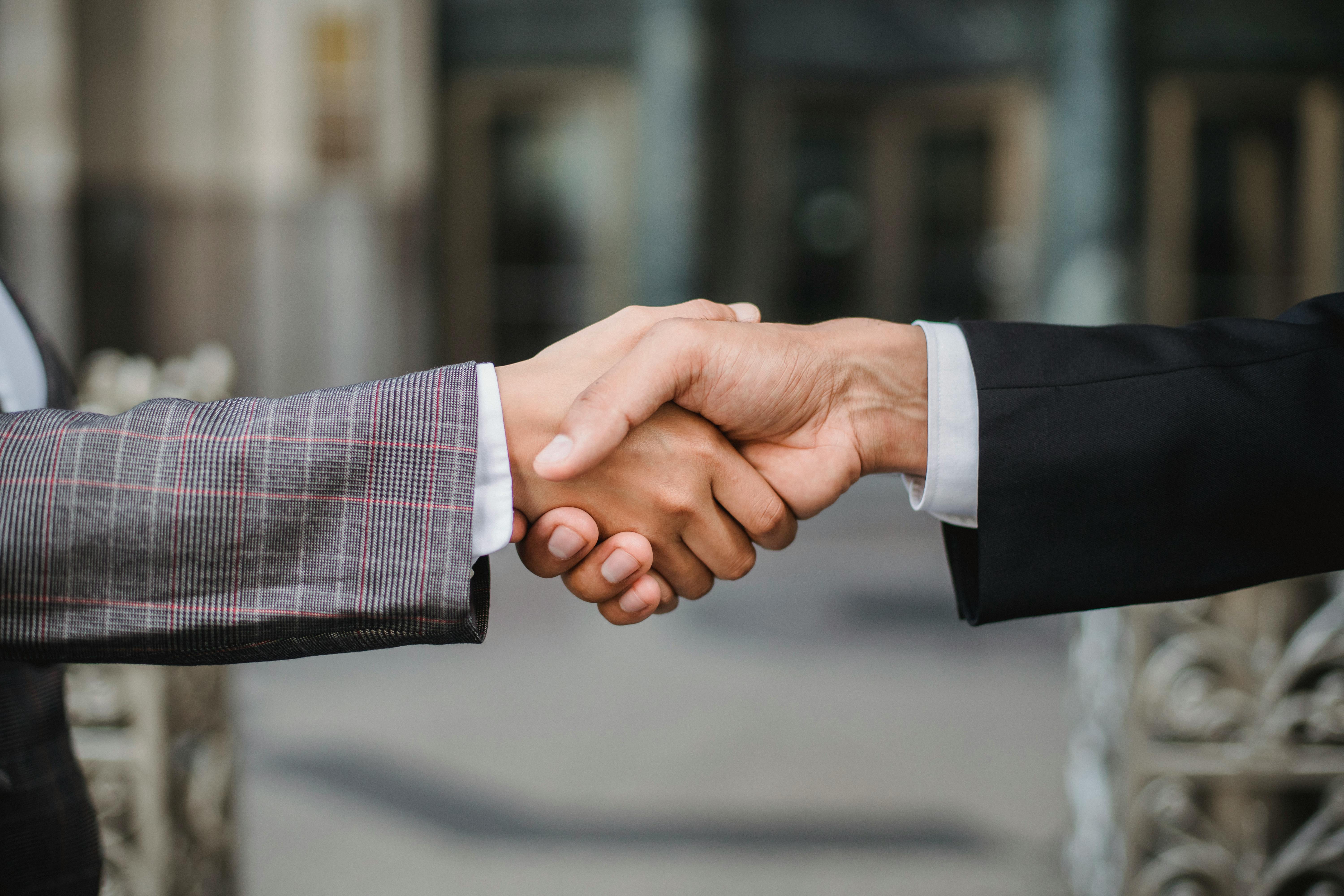 Professional handshake – get in touch